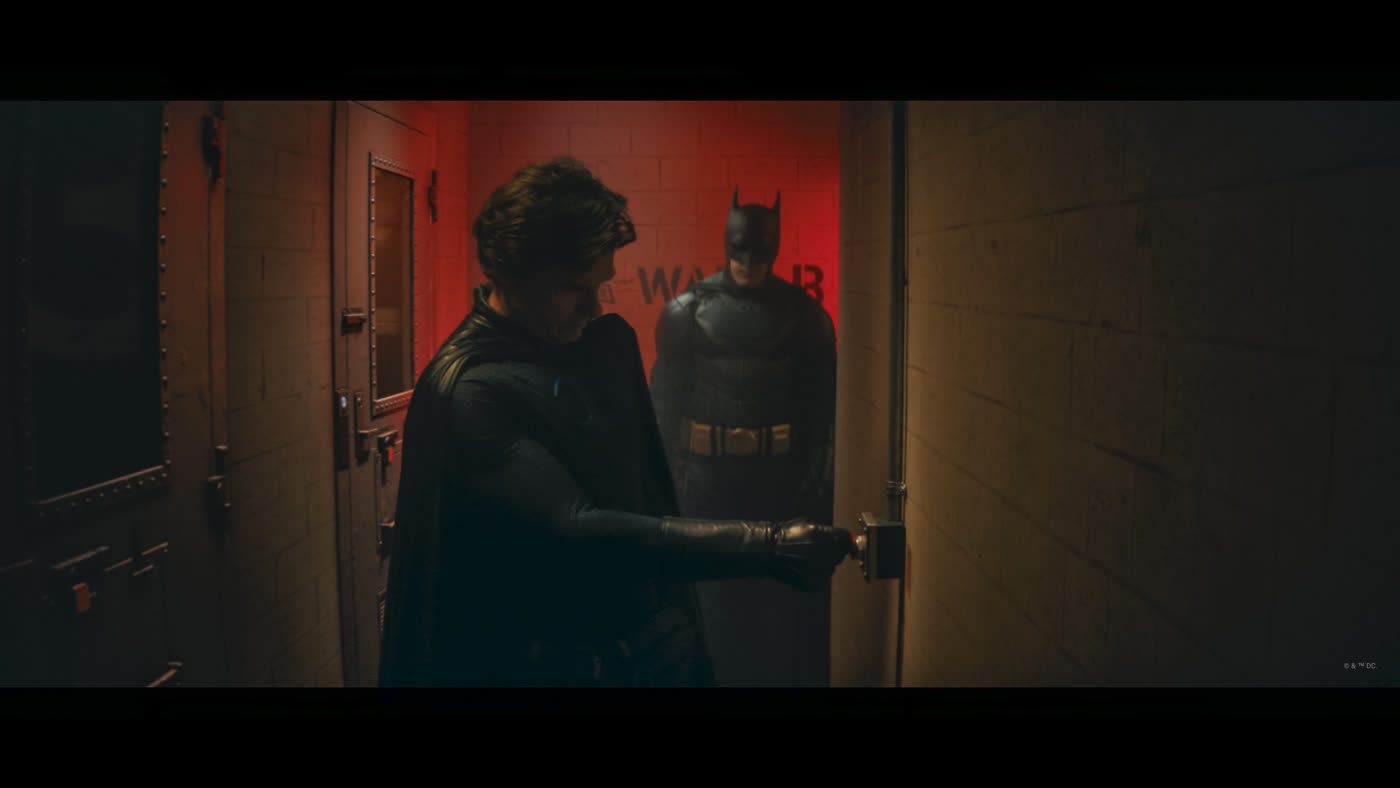 State Farm ‘Batman vs. Bateman’ — a caped figure and Batman in a red-lit corridor